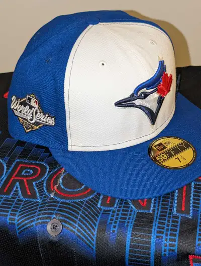 WANNA WIN THE HOLIDAYS? Give them a Jays World Series hat! 7 7/8, View more