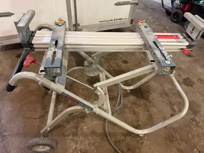 Bosch T4B Gravity Rise chop saw stand. Made for Bosch saws but is adaptable to many saws. Works well...