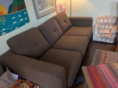 This used hide-a-bed futon couch is in good condition and offers a versatile seating and sleeping so...