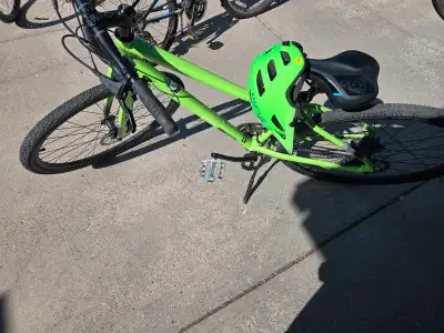 Available ... like new Norco Indie 2 ... Kind of a lime green yellow. Upgraded handlebar pads, metal...