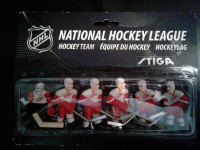 Set of STIGA tablehockey men. Red wings. Sealed package.