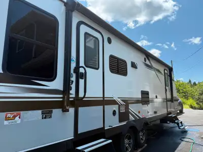 Couples trailer in immaculate condition. Sleeps 6 with lots of inside storage. Very bright interior...