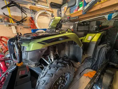 This pre-owned Honda Rubicon is ready for your next outdoor adventure, featuring independent rear su...