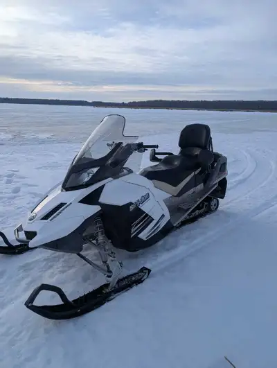 Electric start. Heated grips and thumb, heated grips on back seat also. Accessory plugin on the fron...