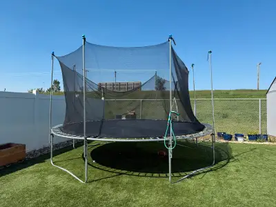 14 Foot Trampoline with Safety net and sprinkler attachment , View more