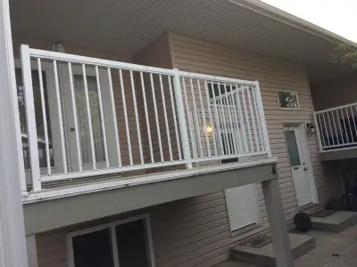 Open concept on main floor with living room, dining area and kitchen, that comes with a working spac...