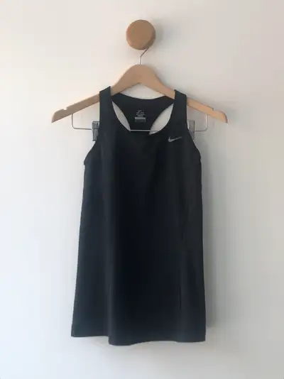 Originally $70. Compression tank with build in bra, great support for workouts and a snatched waist....