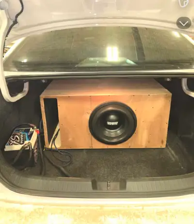 Sundown audio x12v3 rated at 2000rms comes in a baltic birch box built to spec, tuned to 32hz . Sund...