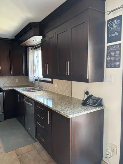 kitchen cabinets with granite countertops in good condition , View more