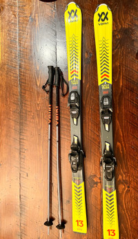 Skiis (140cm), boots (25.5) and poles (105cm) helmet and goggles