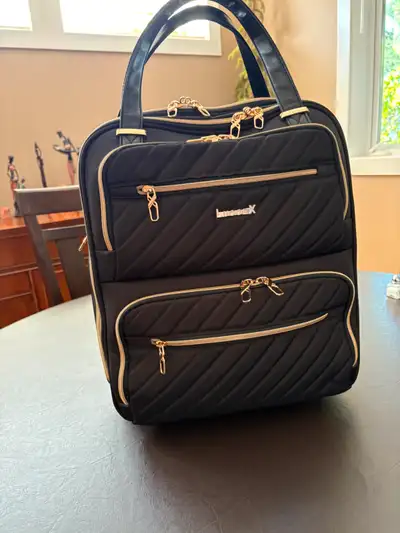 Carry on luggage that fits under most airplane seats, View more