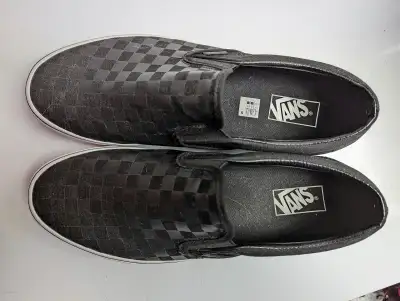 Vans checkerboard slip ons. Size 12. Worn once. Not in box. Retail for 80 bucks as you can see in th...