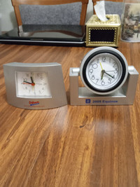 Two Alarm Clocks, both battery operated. GM & Oshawa Generals.
