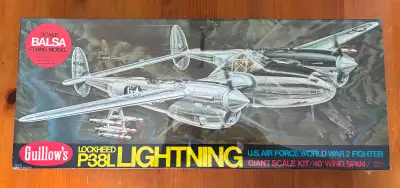 This kit is factory sealed. It is Guillow’s Giant Scale balsa wood flying model of a Lockheed P-38L...