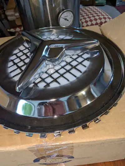 Brand new vintage hubcaps 15-in. 400$ obo