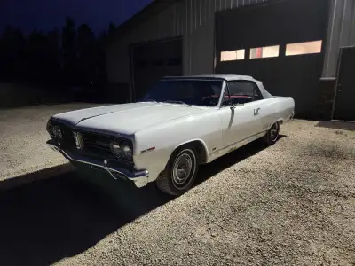 1965 Acadian Beaumont Sport Deluxe Convertible. 230 cu in. 2 spd powerglide. Buckets and console. Ve...