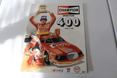 August 1986 Michigan race program. 88pgs. great condition. Starting line up sheet also included. No...
