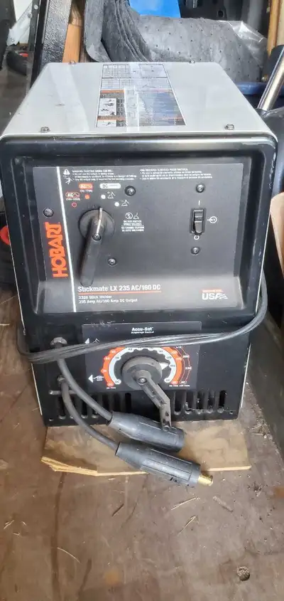 This Hobart Stickmate LX 235 AC/160 DC stick welder is in good, used condition, ready to tackle your...