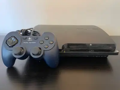 PlayStation 3 system slim and controller, View more