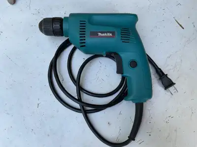 Makita electric 3/8 drill, View more