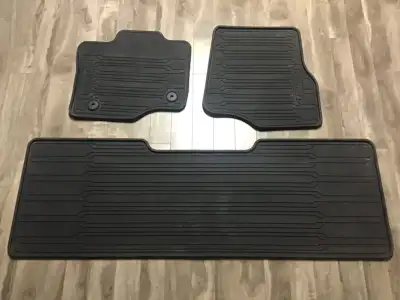 Original F150 floor mats from a supper cab two sets One is rubber winter, front and back, The other...