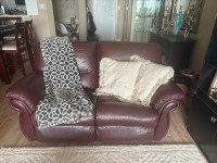 Brown, leather reclining couches