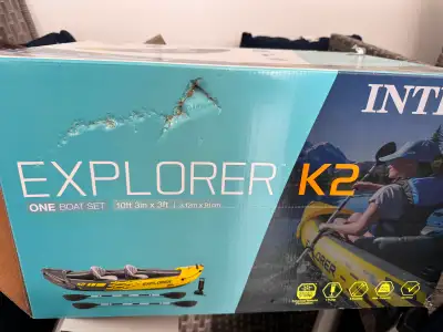 This is an Intex Explorer K2 two-person sit-on-top kayak. It's 10ft 3in by 3ft. Comes with two paddl...