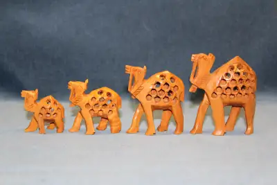 Handcrafted Carved Out Of Wood Camel Family (Set of Four), View more