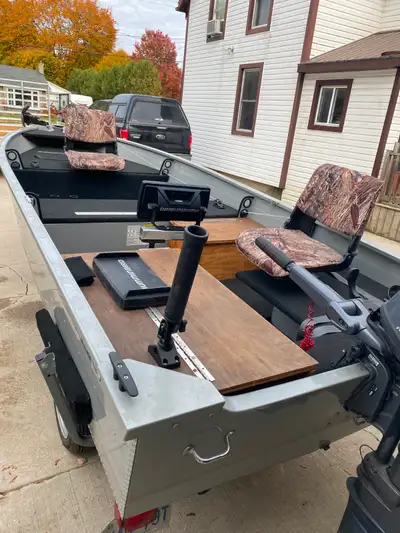 $12,000 Firm Well maintained, 16 Foot Ultra Craft Fishing Boat. Plywood floor covered in carpet. 2-3...