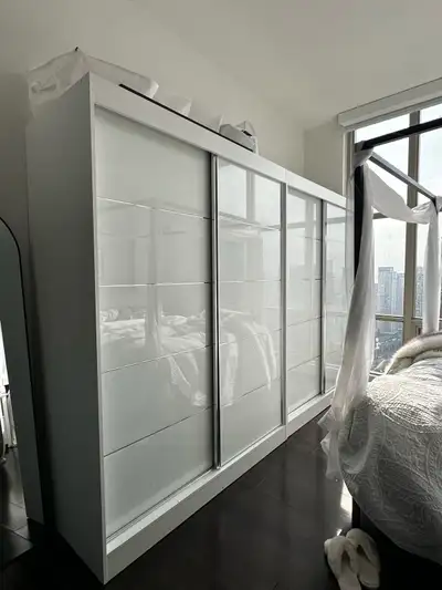 2 Huge White Sliding Glass Wardrobes / Armoires – 7 Hanging Rods, View more