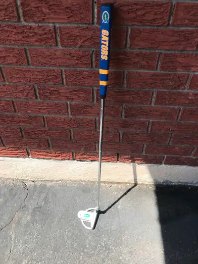 Florida Gators RH putter, 34 inches long. Very good condition. $65. Orleans