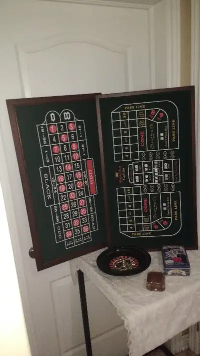 poker table top set, great for bar or mancave, excellent condition, 18 by 32 inches, comes with poke...
