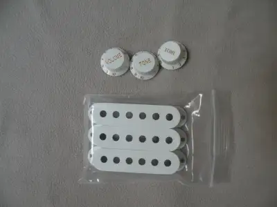 Stratocaster guitar pickup covers and switch tips, View more