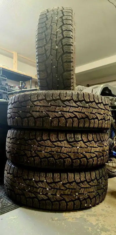 Set of 4 near new condition tires, tread across all barely used. One tire has a plug, refer to pictu...