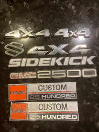 GMC, Suzuki and 4x4 car emblems