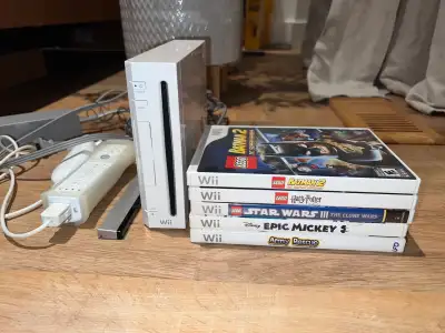 Nintendo Wii console with 5 games, View more