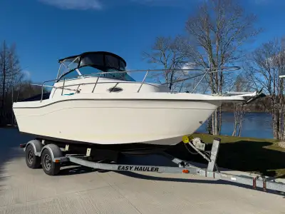 The boat is a 1999 Striper 2100 Walkaround, but it is paired with a 2015 Honda 150 hp with only 165...