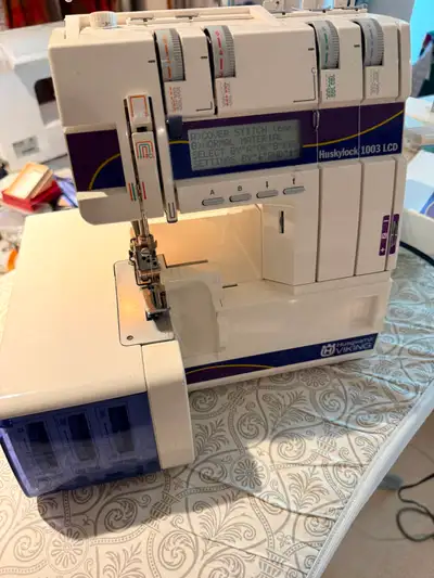 Working 5 spool serger. This machine is a work horse but I'm upgrading sewing studio. It is in good...