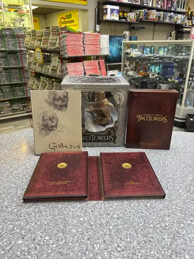 DVD Lord is d the Rings Two Towers with Figure - Boxed - Good Condition Item # 163511 We do offer a...