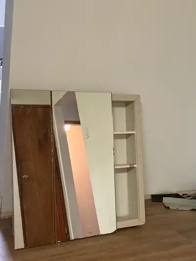 Giving away vanity mirror on a first come first basis.