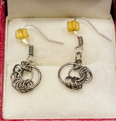 Silver coloured earrings, View more