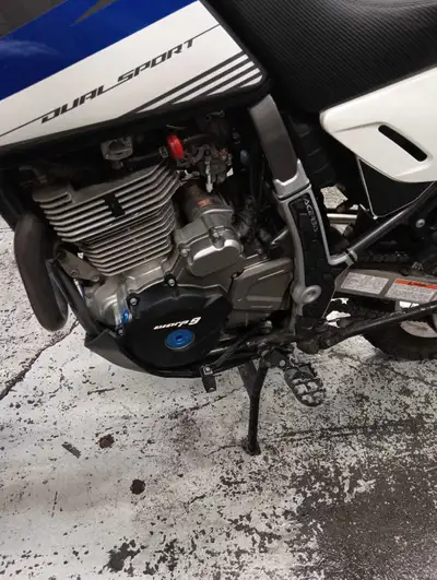 2015 dr650 with 12600km ,excellent shape.many extras. Acerbis skid plate, zedo hand guards with flas...