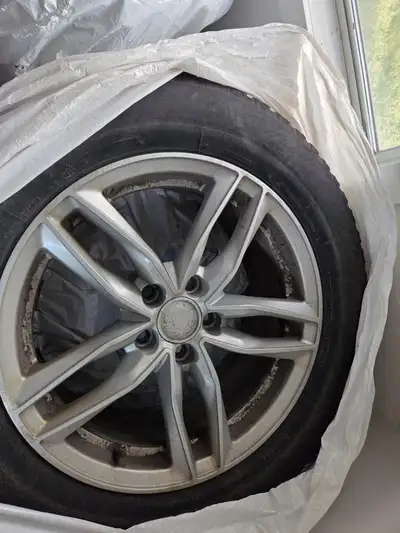 Set of 4 Bridgestone Blizzak WS-80 235/60R17 winter tires on alloy rims. Used on a VW Tiguan. About...