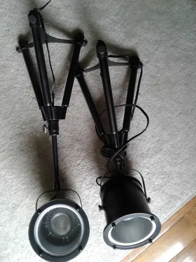 Two Stage Lights on Tripods, height is 20" and extends to another 6”, lamps also rotate. Comes with...