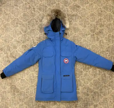 Authentic Canada Goose Expedition Parka in women’s extra small, featuring a beautiful blue color. Th...