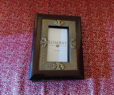 I am selling this picture frame and album combination! Originally from Bombay Company (Bombay Furnit...