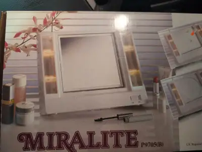 Miralite Makeup Mirror with lights . Brand new in the box Price $20