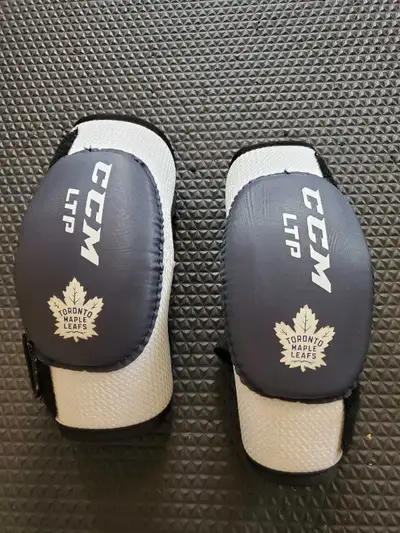 CCM LTP Hockey Elbow Pads – Toronto Maple Leafs - Junior Small, View more