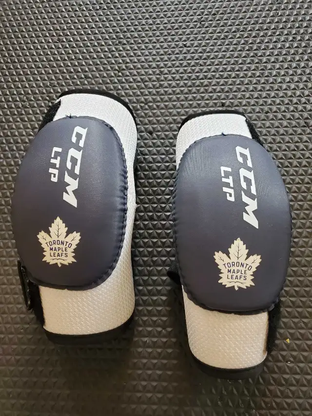 CCM LTP Hockey Elbow Pads – Toronto Maple Leafs - Junior Small in Hockey in Markham / York Region - Image 2