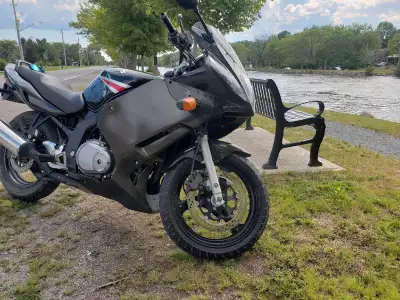 Runs and drives good, very cheap on insurance. Rear tire has some cracking and one of the front fork...